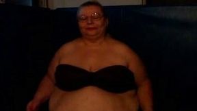 Fat and slutty blonde granny on webcam showing her huge tits