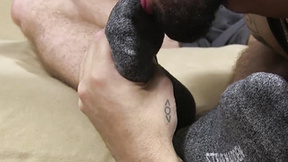 Bearded jock shows us how well he can lick toes over socks