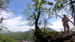 Exhibitionist Girl walks in the mountains