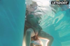 Watch Victoria Summers getting her big boobs drenched in steamy sauna action by George Uhl