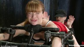 ”Bent forward in device ass plugged”