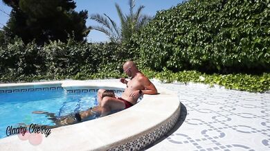 Claary Cherry gets facially drenched by a wet pool blowjob