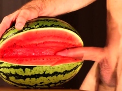 Muscular Stud Fucks and Cums on Watermelon