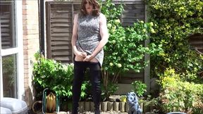 Thigh-booted Crossdresser Strokes Outdoors