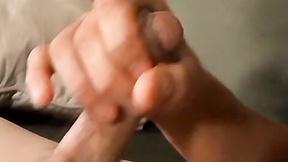 ”Well-built young homo strokes his prick & cums on his face”