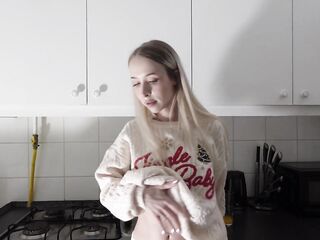 Amazingly charming small blond hawt college cutie in her dormitory kitchen getting willing for Christmas Party