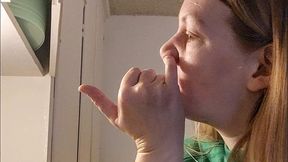 Nose picking booger eating in the kitchen while doing dishes. Blowing nose and snot