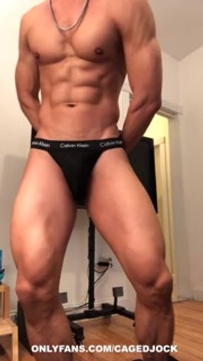 Muscle chastity jock posing