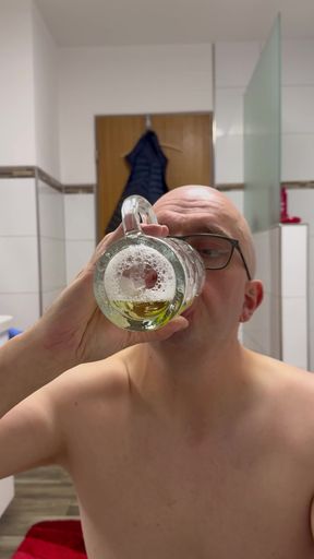 Slave Christoph drinks his own piss