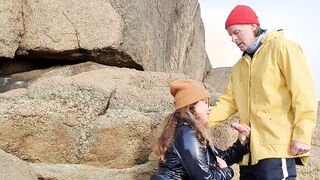 Missus inside shiny raincoat giving hand job and fellatio to stranger wearing raincoat