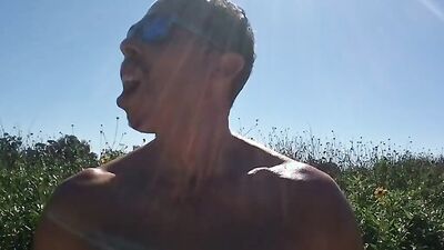 Muscular guy public masturbation at a popular park. People passing by...interrupting him! RISKY!!!