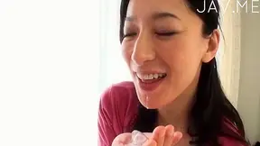 Dark haired and pretty japanese  is swallowing snake