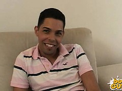 Two cute boys get ready to jerk each other off.