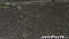 Wicked  Japanese babe is peeing in front of her house