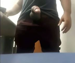 Brazilian Daddy Strokes His Big Uncut Cock at Work
