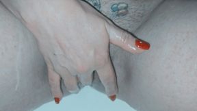 Milf shaving her pussy up close and lots of soap