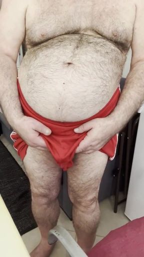 Coach Karl&#039;s Balls Accidentally Slip Out of His Gym Shorts, While Stroking His Cock.