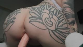 British tattooed redhead fucks herself deep