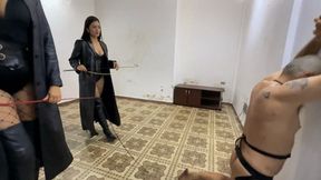 Merciless whipping in full leather by Kalinda and Adrianna