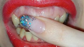 I massage my gums and then I lick my nails