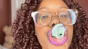 Purple Lipgloss Chewing Gum & Blowing Bubbles