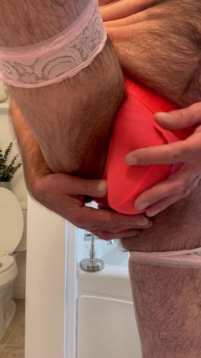 Bulge play orange thong