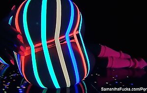 Colorful blacklight teasing with Samantha Saint