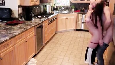 Lustful MILF was lured into kitchen sex by son's jock buddy