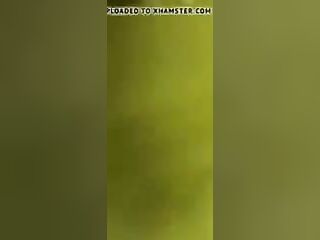 2 lesbians in a bar bathroom.