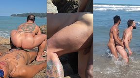 homens fazendo sexo nas pedras da praia