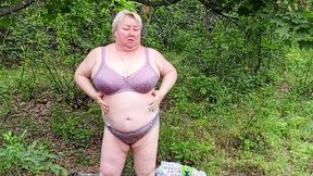 neighbor undressed in a public park and masturbates her pussy