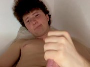 Cute curly twink cumming out of his huge pierced cock then showing off