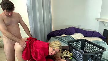 Stepmom lets her stepson fuck her while folding clothes