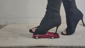 Giantess goddess Charlie Caroline Crushes a 1980 Chevrolet El Camino in knee high open toe boots with painted toenails close ground view