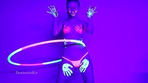 Dances And Hula Hoops Under A Black Light