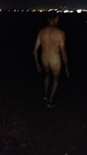 Naked Walking on the Hill Along Highway