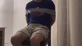 Gagged and duct taped to chair
