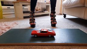 GIANTESS Charn crushes a 1969 Ford Torino in black stiletto high heels closeup ground view