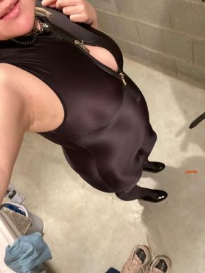 Handjob in black spandex catsuit