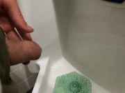 peeing at urinal