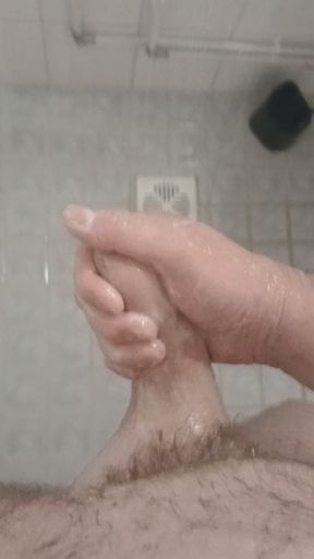 Xander masturbating his big cock in the shower and cums!