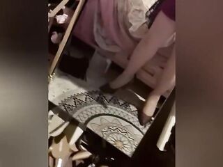 Dude wearing hose and red heels