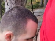 Hairy boys blowing a load together on a mountain top.