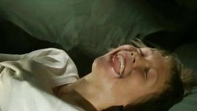 Young retro brunette hotly fondles her medium tits and strokes pussy