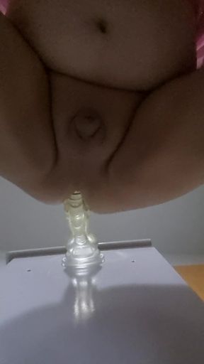 Chubby Sissy Guy riding a monster Dildo