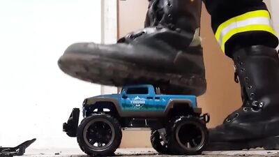 Firefighter Stomping old Toy Truck