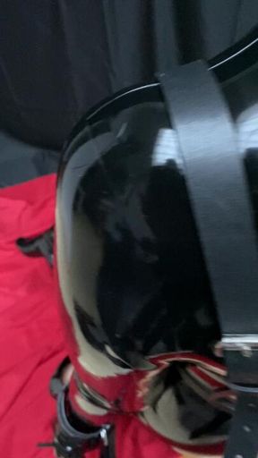 Me in ankle cuffs and latex catsuit