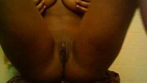 Black beauty with big tits masturbates on webcam for me