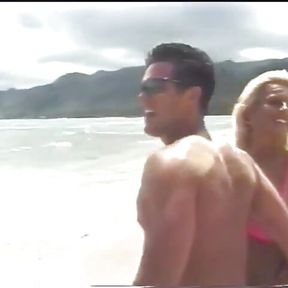 Tanned blonde and a dude are fucking on the beach