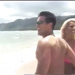 Tanned blonde and a dude are fucking on the beach